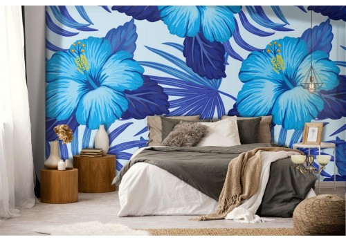 Blue tropical leaves and flowers wallpaper.