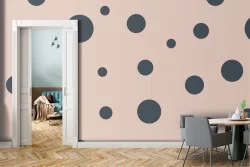 Polka dot pattern wallpaper decoration in pink and black.