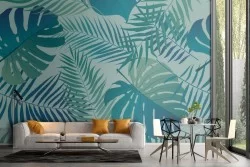 Tropical leaves wallpaper in aqua green pattern.