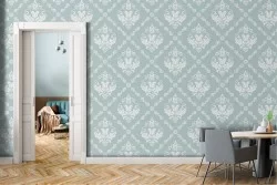 Vintage damask wallpaper pattern in light blue.