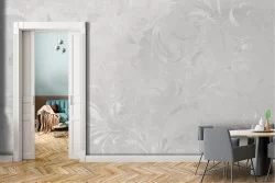 Wallpaper with stylized leaves on a vintage marble surface