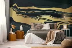 Black marble surface wallpaper with gold details