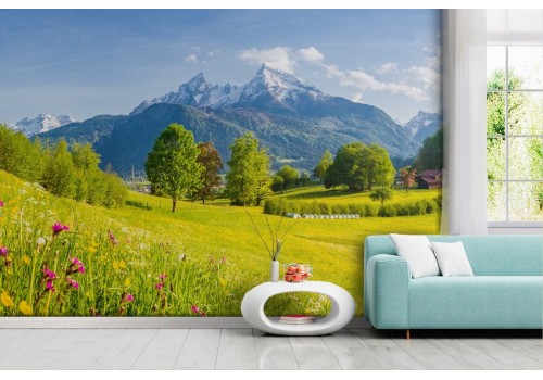 Carta da parati colline verdi in fiore e montagna con neve