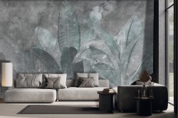 Large tropical leaves wallpaper on concrete background