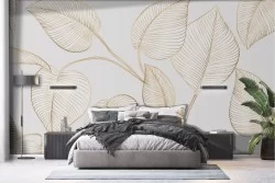 Stylized tropical leaves gold wallpaper