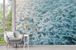 Carta da Parati uomo che fa surf sulle onde