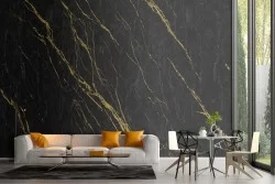 Black marble surface wallpaper with gold veins