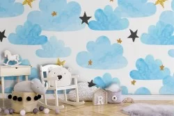 Wallpaper pattern clouds and stars for children.