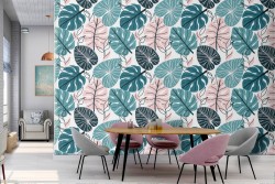 Green tropical wide leaves pattern wallpaper.