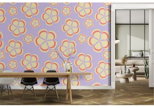 Wallpaper with stylized flowers with yellow and pink petals.