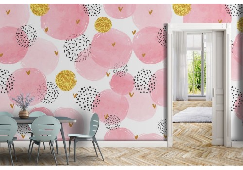 Abstract pink and gold polka dot wallpaper.