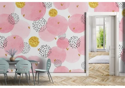 Abstract pink and gold polka dot wallpaper.