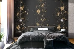Black and gold flowers wallpaper with luxury pattern effect.